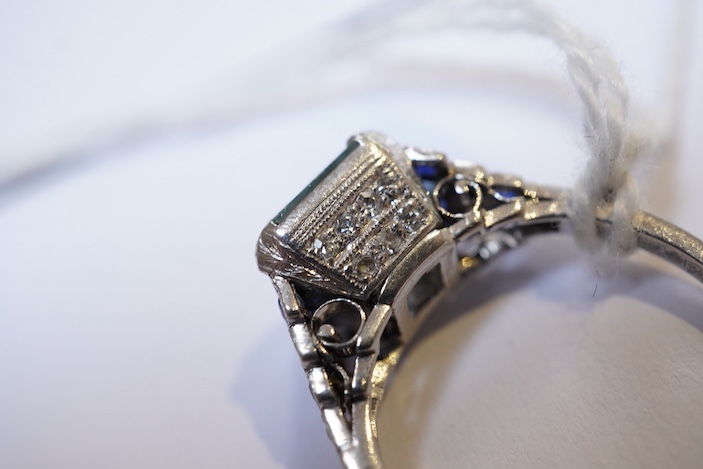 An aquamarine, sapphire and diamond ring